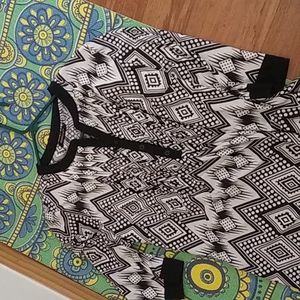 Top. Reborn. Not worn. Black and white. Flowy.